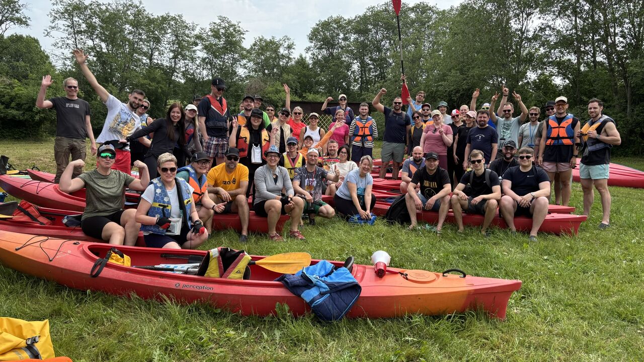 Evaldas Jablonskas and OIXIO colleagues at a team kayaking event